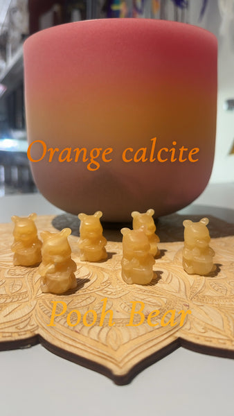 Pooh orange calcite carving